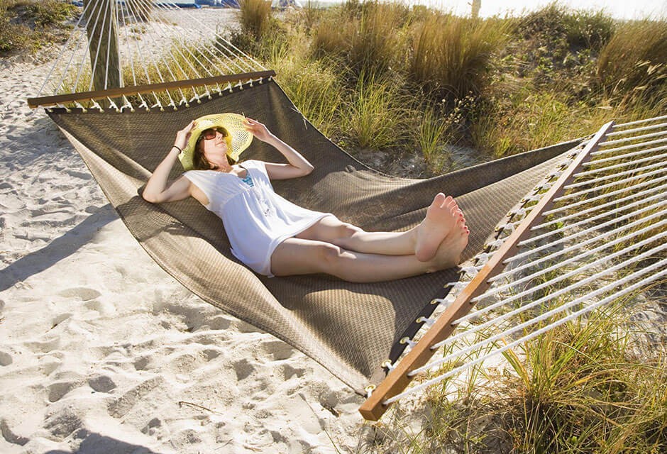 woman on beach hammock